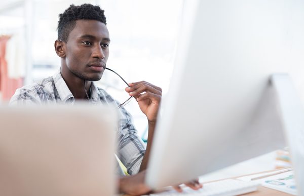 bigstock-Attentive-executive-working-on-194705368