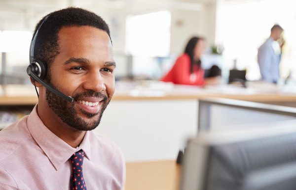 bigstock-Black-male-call-centre-worker--249334024