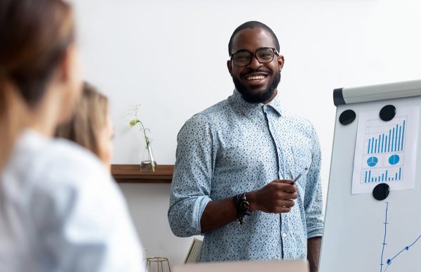 bigstock-Business-Coach-Teach-Staff-Gat-273078754