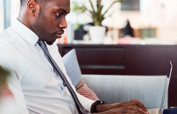 bigstock-Businessman-Working-On-Laptop--313338625