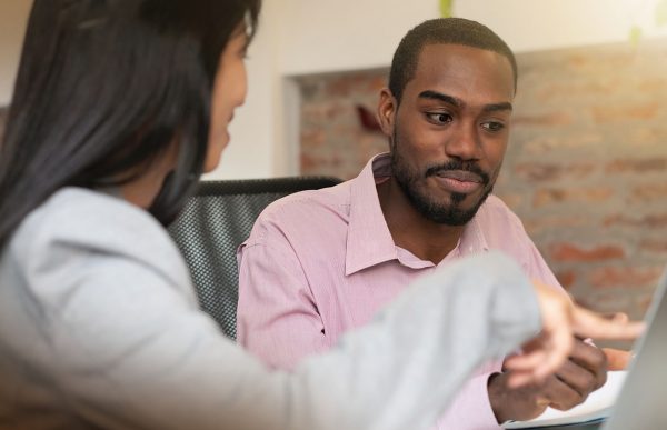 bigstock-Colleagues-in-office-going-thr-278737963