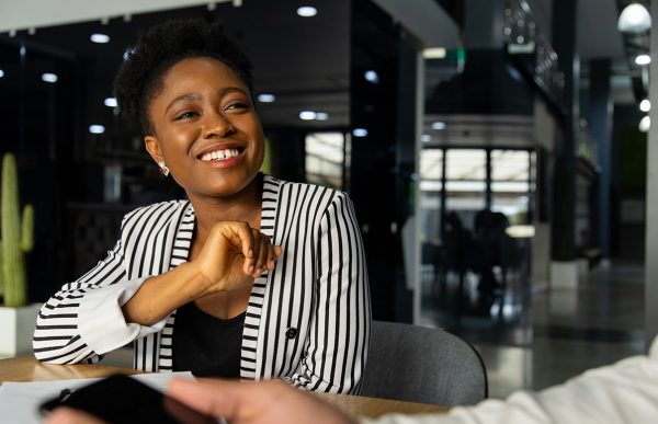 bigstock-Confident-Young-African-Busine-360485860