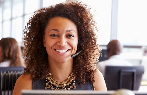 bigstock-Woman-working-in-a-call-centre-101229710