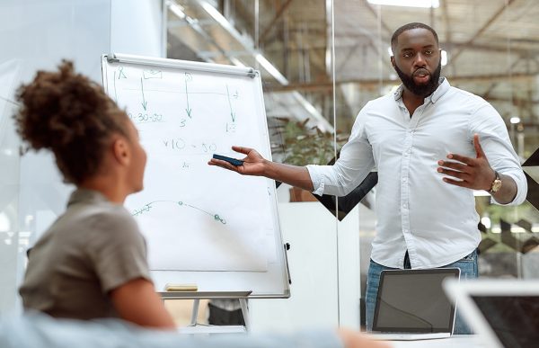 bigstock-Young-Afro-American-Businessma-336010636