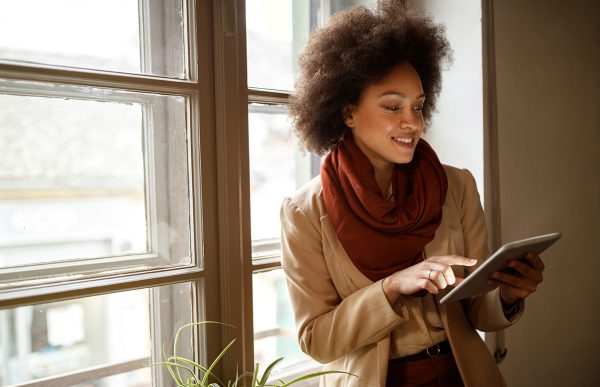 bigstock-Young-Afro-American-woman-near-266969440